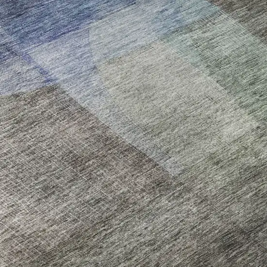 8' Brown Green And Blue Abstract Washable Round Rug With UV Protection Photo 8