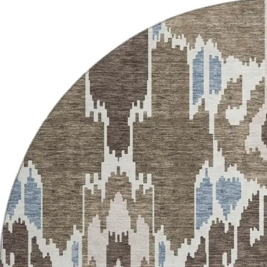8' Brown Ivory And Blue Ikat Washable Round Rug With UV Protection Photo 3