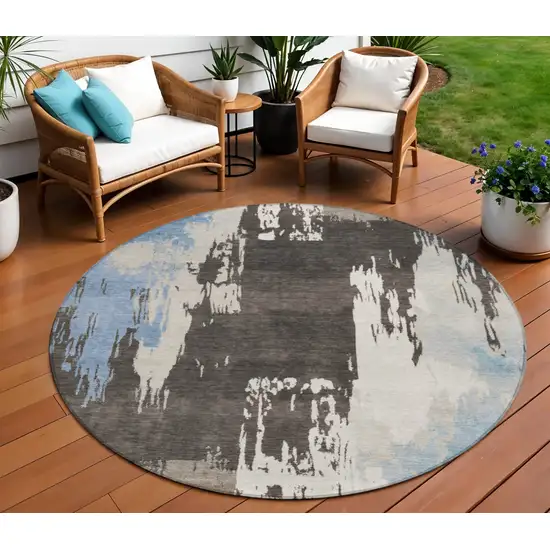 8' Brown Ivory And Blue Round Abstract Washable Indoor Outdoor Area Rug Photo 1