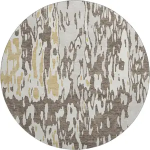 Photo of 8' Brown Ivory And Gold Abstract Washable Round Rug With UV Protection