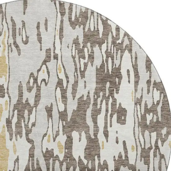 8' Brown Ivory And Gold Abstract Washable Round Rug With UV Protection Photo 2
