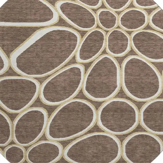 8' Brown Ivory And Gold Geometric Washable Round Rug With UV Protection Photo 2