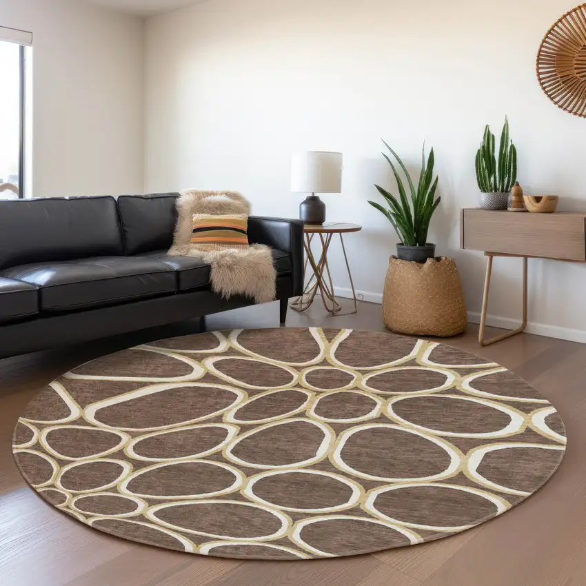 8' Brown Ivory And Gold Geometric Washable Round Rug With UV Protection Photo 4
