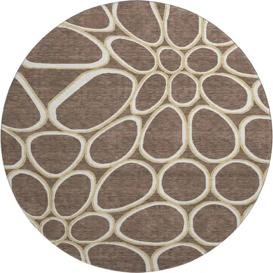 8' Brown Ivory And Gold Geometric Washable Round Rug With UV Protection Photo 1