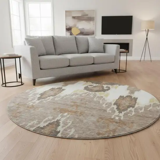 8' Brown Ivory And Gold Ikat Washable Round Rug With UV Protection Photo 2
