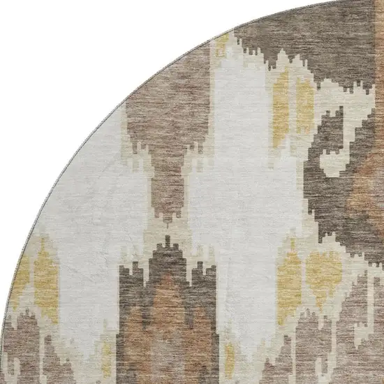 8' Brown Ivory And Gold Ikat Washable Round Rug With UV Protection Photo 4