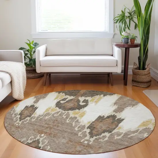 8' Brown Ivory And Gold Ikat Washable Round Rug With UV Protection Photo 5