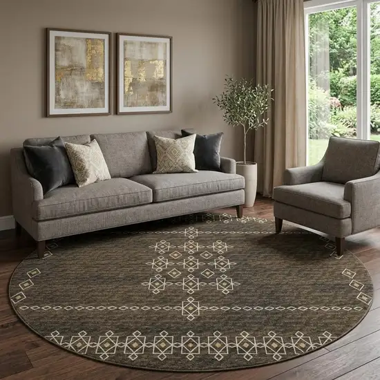 8' Brown Ivory And Gold Tribal Washable Round Rug With UV Protection Photo 1
