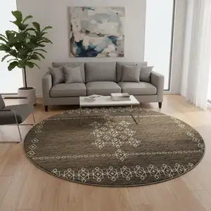 Photo of 8' Brown Ivory And Gold Tribal Washable Round Rug With UV Protection