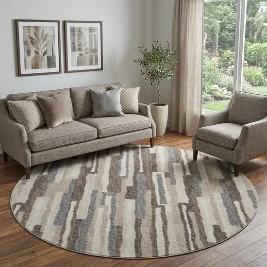 8' Brown Ivory And Gray Abstract Distressed Washable Round Rug With UV Protection Photo 1