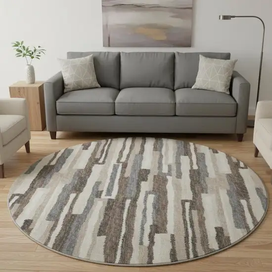 8' Brown Ivory And Gray Abstract Washable Round Rug With UV Protection Photo 1
