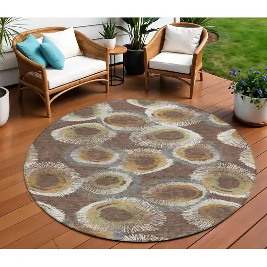 8' Brown Ivory And Green Round Geometric Washable Indoor Outdoor Area Rug Photo 1
