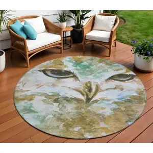 Photo of 8' Brown Ivory And Green Round Owl Washable Indoor Outdoor Area Rug