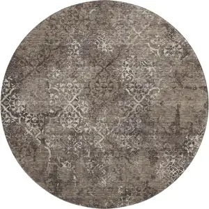 Photo of 8' Brown Ivory And Taupe Abstract Washable Round Rug With UV Protection