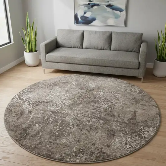 8' Brown Ivory And Taupe Abstract Washable Round Rug With UV Protection Photo 2