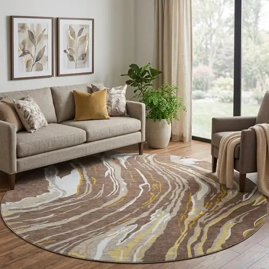 8' Brown Ivory And Taupe Abstract Washable Round Rug With UV Protection Photo 1