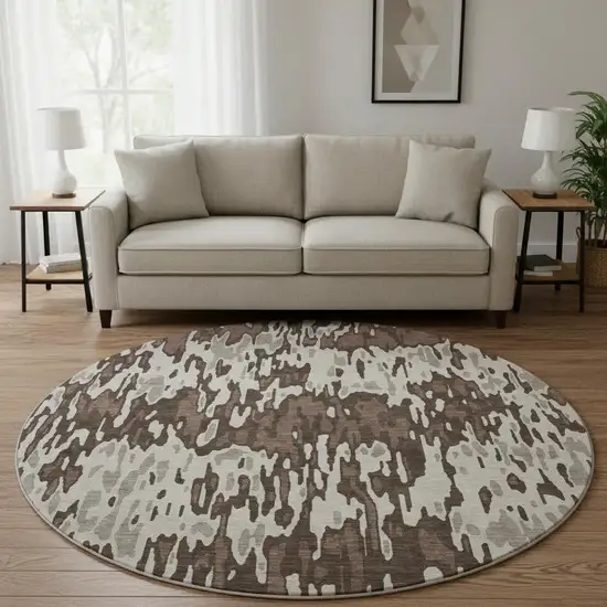 8' Brown Ivory And Taupe Striped Washable Round Rug With UV Protection Photo 2
