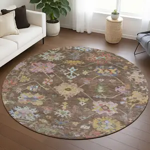 Photo of 8' Brown Pink And Blue Round Floral Washable Indoor Outdoor Area Rug