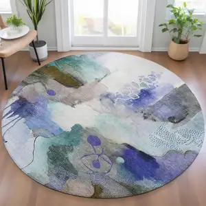 Photo of 8' Brown Purple And Ivory Round Abstract Washable Indoor Outdoor Area Rug