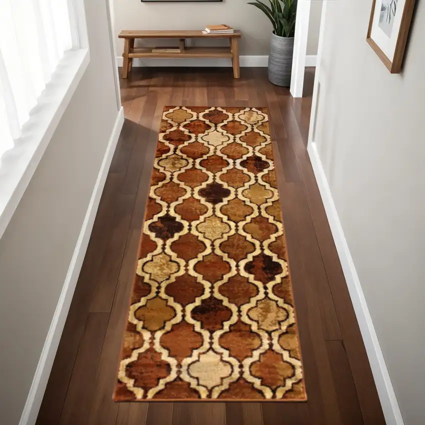 8' Brown And Ivory Quatrefoil Distressed Runner Rug Photo 1