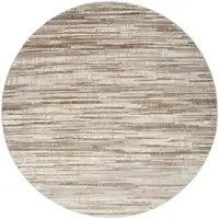Photo of 8' Brown Round Abstract Power Loom Area Rug