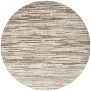 Photo of 8' Brown Round Abstract Power Loom Area Rug