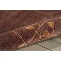 Photo of 6' Brown Round Floral Power Loom Area Rug