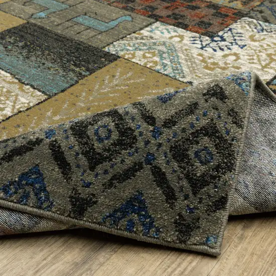 8' Brown Tan And Dark Blue Patchwork Runner Rug Photo 9