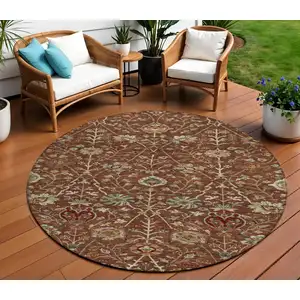 Photo of 8' Brown Tan And Red Round Floral Washable Indoor Outdoor Area Rug
