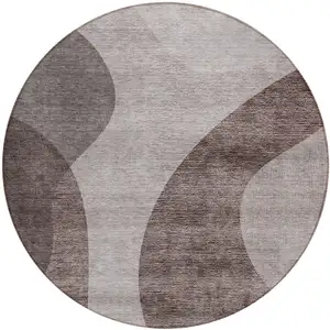 Photo of 8' Brown Taupe And Beige Round Abstract Washable Indoor Outdoor Area Rug