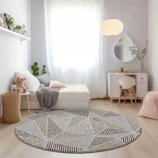 8' Brown Taupe And Beige Round Geometric Washable Indoor Outdoor Area Rug Photo 7