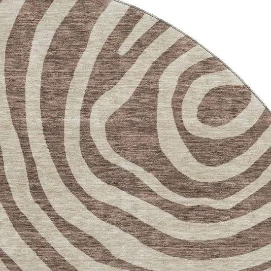8' Brown Taupe And Ivory Abstract Washable Round Rug With UV Protection Photo 3