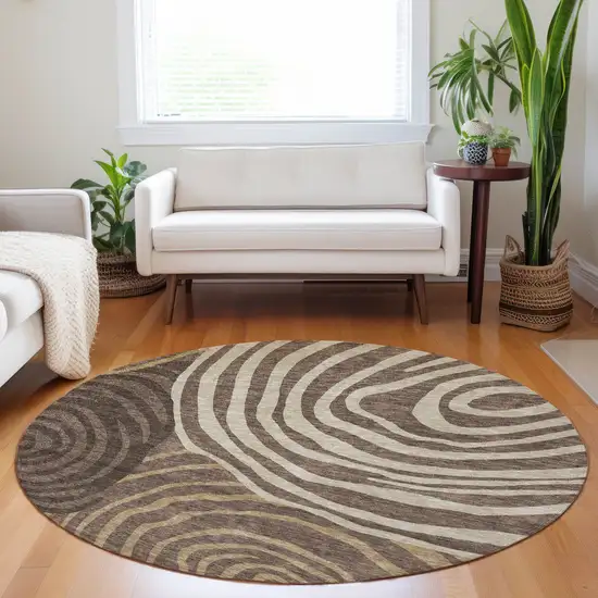 8' Brown Taupe And Ivory Abstract Washable Round Rug With UV Protection Photo 5