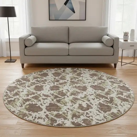 8' Brown Taupe And Ivory Abstract Washable Round Rug With UV Protection Photo 2