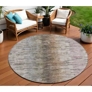 Photo of 8' Brown Taupe And Ivory Round Abstract Washable Indoor Outdoor Area Rug