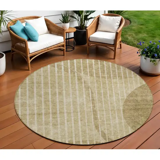 8' Brown Taupe And Ivory Round Striped Washable Indoor Outdoor Area Rug Photo 1
