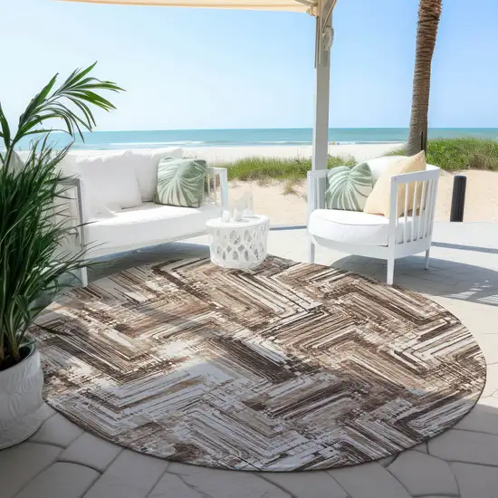 8' Brown Taupe And Tan Round Geometric Washable Indoor Outdoor Area Rug Photo 6