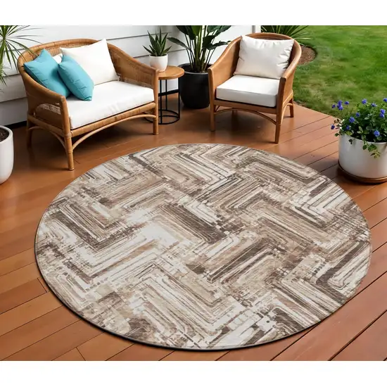 8' Brown Taupe And Tan Round Geometric Washable Indoor Outdoor Area Rug Photo 1