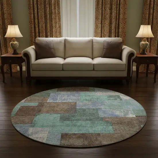 8' Brown Teal And Ivory Geometric Washable Round Rug With UV Protection Photo 2