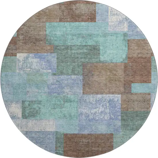 8' Brown Teal And Ivory Geometric Washable Round Rug With UV Protection Photo 1