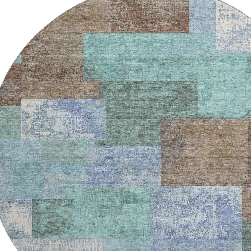 8' Brown Teal And Ivory Geometric Washable Round Rug With UV Protection Photo 3