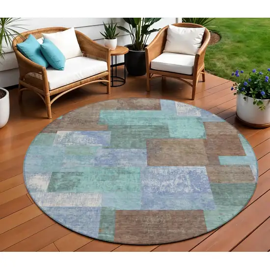 8' Brown Teal Blue And Ivory Round Geometric Washable Indoor Outdoor Area Rug Photo 2