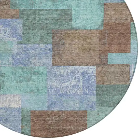 8' Brown Teal Blue And Ivory Round Geometric Washable Indoor Outdoor Area Rug Photo 8