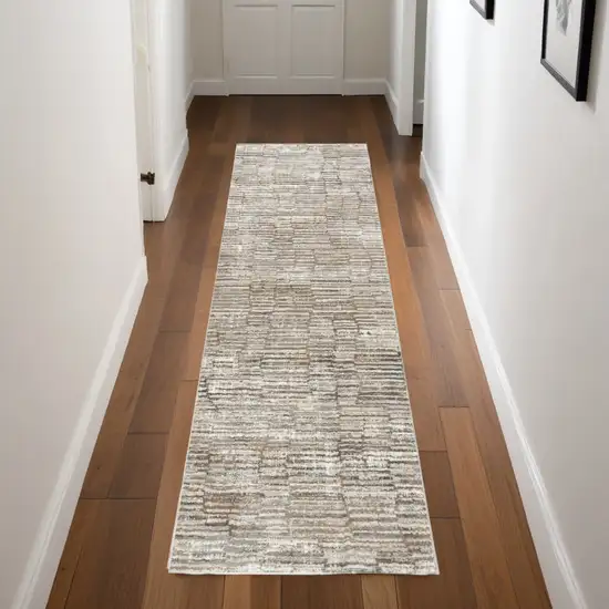 8' Brown and Ivory Abstract Runner Rug Photo 1