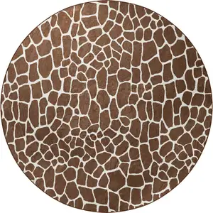 Photo of 8' Brown and Ivory Round Animal Print Handmade Non Skid Area Rug