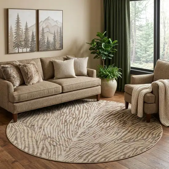 8' Brown and Tan Animal Print Power Loom Round Rug Photo 1