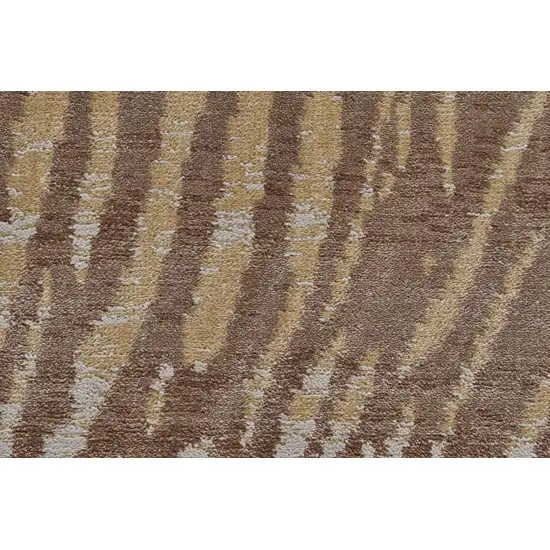 8' Brown and Tan Animal Print Power Loom Round Rug Photo 4