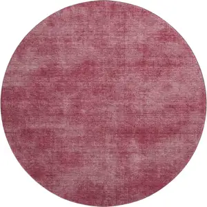Photo of 8' Burgundy And Blush Abstract Washable Round Rug With UV Protection