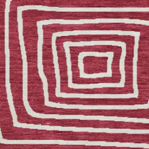 Photo of 8' Burgundy And Ivory Geometric Washable Round Rug With UV Protection