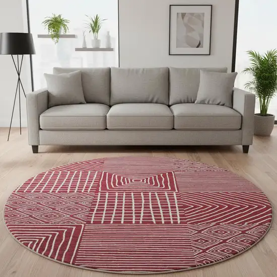 8' Burgundy And Ivory Geometric Washable Round Rug With UV Protection Photo 2